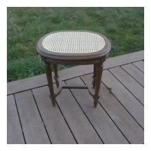 Tabouret de piano canné