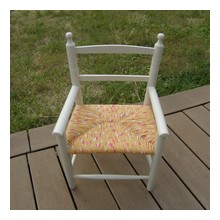Chaise enfant en paille enrobée de tissu jaune