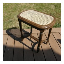 Tabouret de piano canné